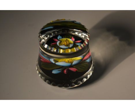 Perthshire Paperweights - a concentric Bouquet weight, blue and ruby red buds interspersed with light blue buds, jet black gr