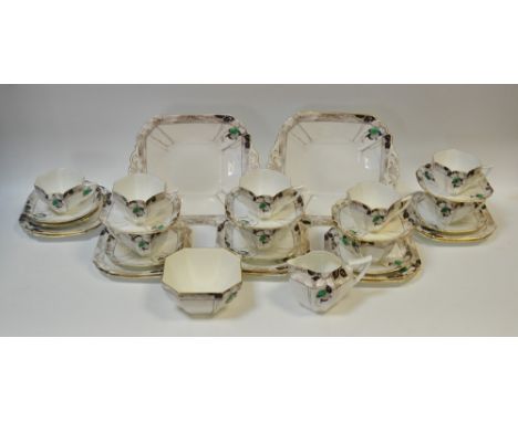 A Shelley Queen Anne shape Green Damson pattern nine-setting tea service, comprising a pair of shaped square bread plates, mi