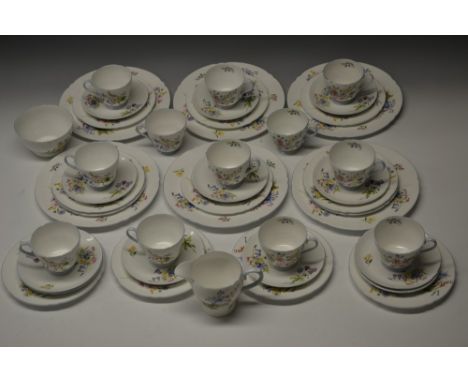 A Shelley Wild Flowers tea service, for twelve, comprising teacups, saucers, side plates, milk jug, sugar bowl and six desser