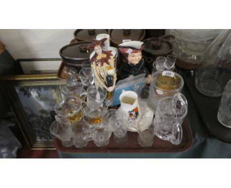 A Tray of Sundries to Include Novelty Cherry Brandy Decanter In the Form of Three Dice, Clown Ornament, Character Jug, Custar