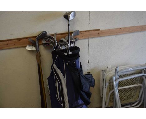 Bag of golf clubs together with a set of vintage golf clubs, to include Taylormade driver and a Callaway Odessey Gap wedge