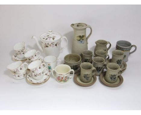 A six place studio pottery coffee set with painted blue and brown decoration including coffee pot, milk jug and sugar bowl, t