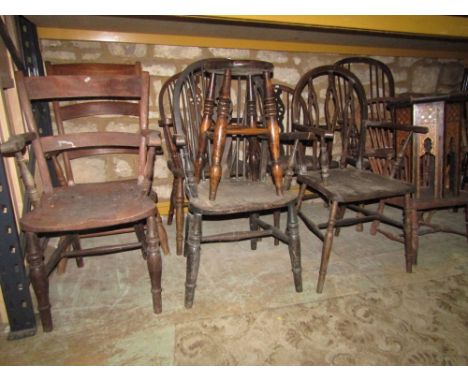 A mixed collection of 19th century and later Windsor elbow chairs (8) comprising Oxford bar backs, wheel backs, comb backs, e