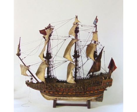 Scale model of HMS Royal Soverign, a three mast war ship, with canons, flags and figures