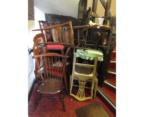 A collection of eleven Georgian and later dining, side and occasional chairs of varying design, together with an iron telesco