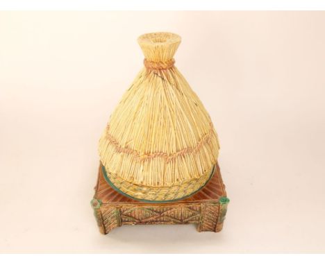 A 19th century George Jones majolica cheese dish and stand in the form of a wheatsheaf with typical sky blue interior glaze, 