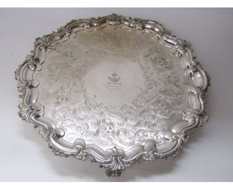 Large and impressive silver plated salver with cast acanthus scrolled rim over a bowl engraved with scrolled foliage and cart