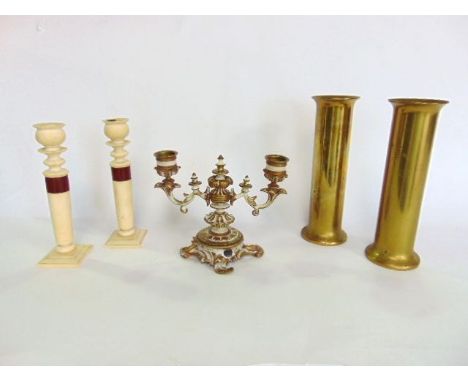 A mixed lot to include a French ormolu Rococo twin branch candlestick, two Trench Art shell spill vases and a pair of Art Dec