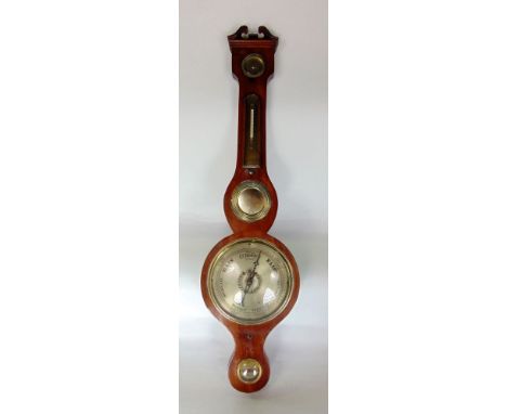 A walnut aneroid barometer thermometer, with silvered and brass dials, 95cm high