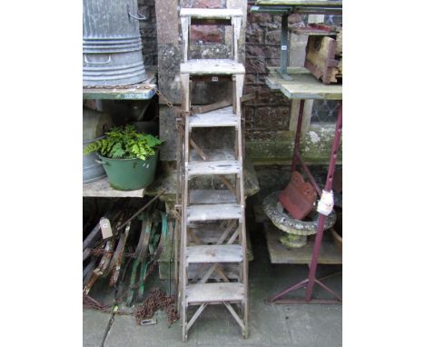 A vintage Hatherley pine folding step ladder together with one other, (to be sold for decorative display purposes only)
