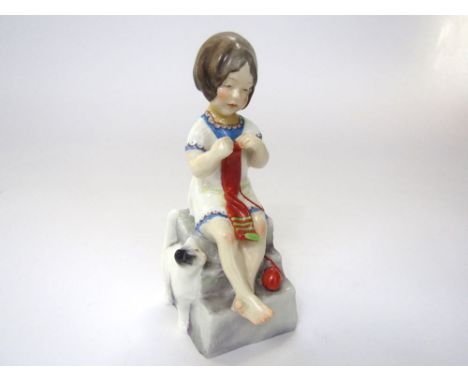 A Royal Worcester figure of Saturday's Child Works Hard For a Living in the form of a little girl knitting and accompanied by