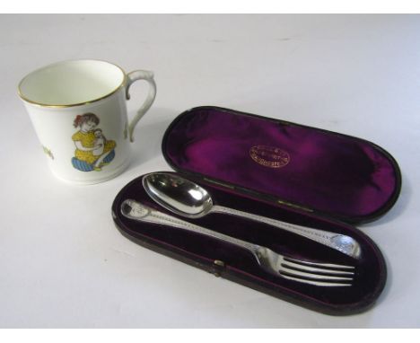 Victorian silver presentation fork and spoon with bright cut decoration, London 1879 and boxed Worcester mug (2) 