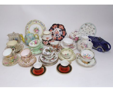 A collection of Royal Worcester floral teawares comprising teapot, milk jug and a trio, together with further decorative teaw