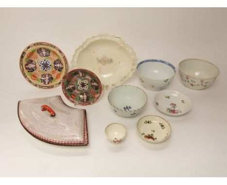 A collection of late 18th and early 19th century English ceramics including an 18th century creamware tea bowl and saucer wit
