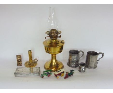 A mixed collection of metalware to include brass oil lamp, brass candle lantern inscribed Palmer & Co, London, a pair of poli