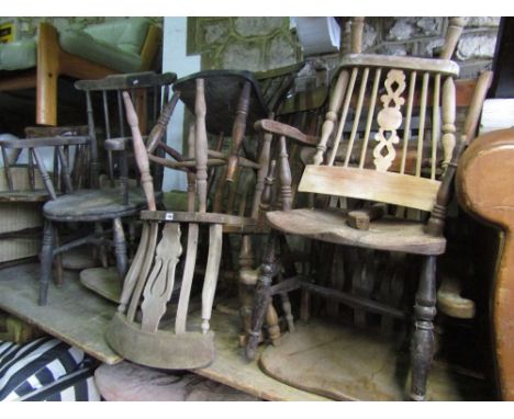 A collection of 19th century Windsor elbow chairs for restoration, various styles, Oxford bar back, stick back, lathe back, e