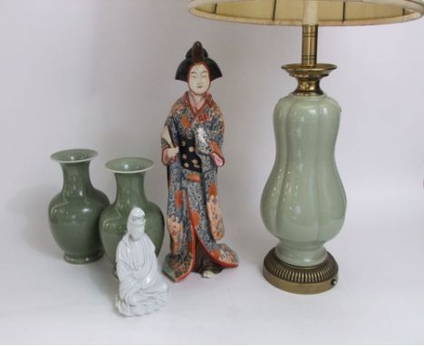 A large lamp base with celadon type glaze and brass fittings including double bulb aperture, with cream shade, 100cm includin