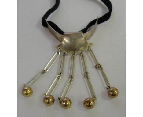 A Danish silver necklace on black velvet tie, marked Nefrom.