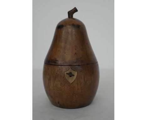 A fruitwood tea caddy in the form of a pear