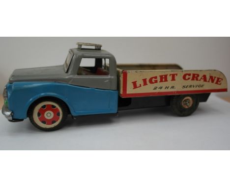 A 1950s tinplate light crane vehicle