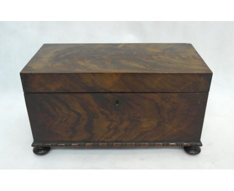 A 19th century mahogany tea caddy.