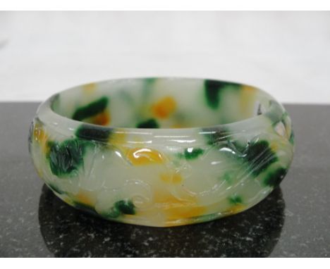 A Jadeite Green, Yellow and White Bangle Carved with Phoenix/Ho-Ho Bird