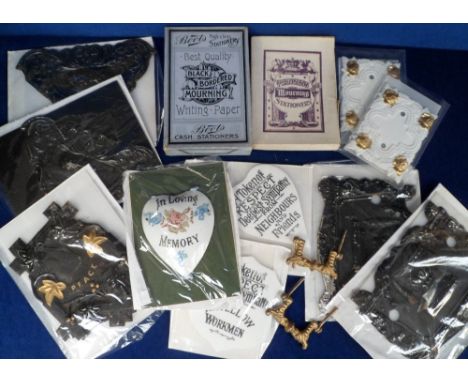 Funeralia, 7 Victorian pressed metal, painted coffin adornments (5 black and 2 white), a later ceramic heart shaped version, 