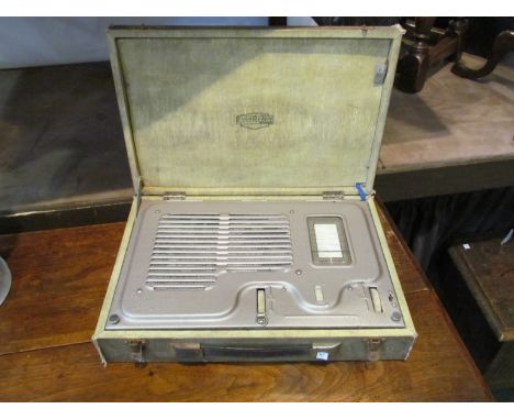 A vintage portable/battery briefcase radio