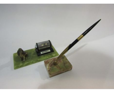 An Art Deco marble desk calendar with cold painted spaniel and a similar pen stand (2)