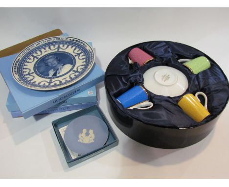 A Royal Worcester boxed coffee cup and saucer set for four commemorating the Queen's 80th birthday, three Wedgwood commemorat