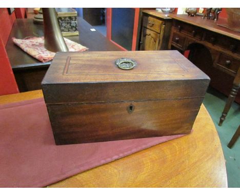 A Victorian mahogany tea caddy