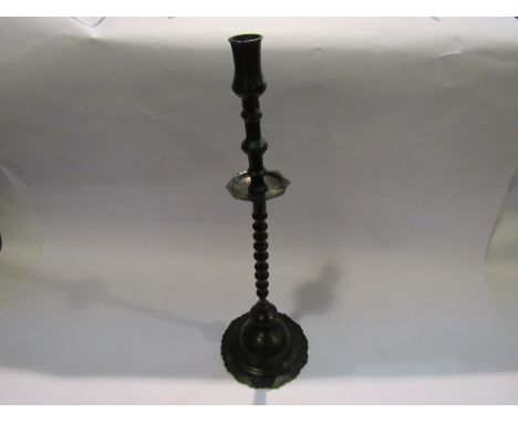 A late 18th Century bobbin turned candlestick with domed base, 49cm tall