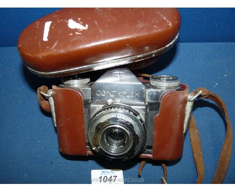 A 1960's Carl Zeiss F 2.8 lens and Zeiss Ikon Contaflex camera.