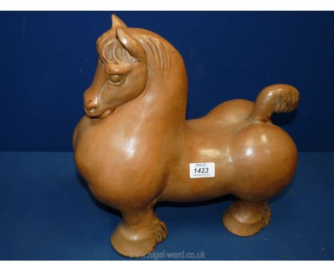 A large ceramic stylized horse, 13" x 13".