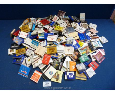 A large bag containing over 220 vintage collectable worldwide matchbooks, unused.
