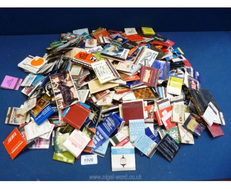 A large bag of over 350 vintage collectible worldwide match books, used.