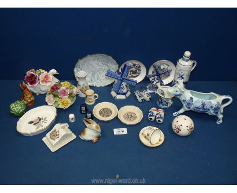 A quantity of Delft ware to include; windmills, cow milk jug, clogs, small pestle &amp; mortar, together with Royal Worcester