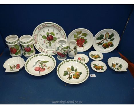 A quantity of Portmeirion Pomona including three vases, two shell dishes, two bowls, two plates, wall clock, three pin dishes