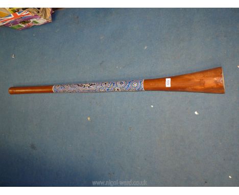A teak hand painted Aboriginal Didgeridoo.