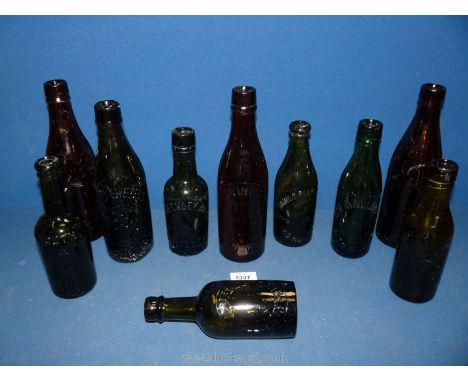 A collection of old beer bottles for Ballinger Monmouth, R.V. Bies Pontypridd, Donnington Stow on the Wold, Spreckley Worcest