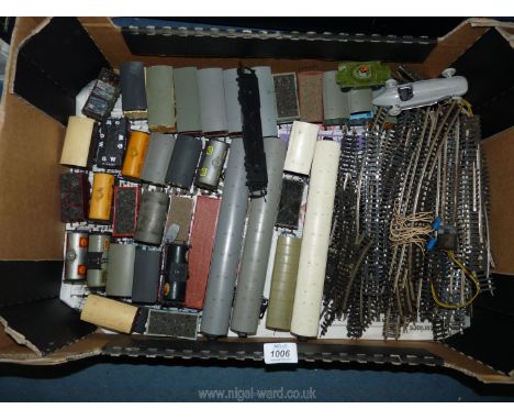 A box of 'OO' gauge train track and various carriages, some Tri-ang, various carts including; coal, shell tankers, etc. Toget