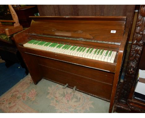 An unusual and compact "Bijouette" upright ship's type Piano, unusually the 5 3/8 octaves with green keys, the action being i