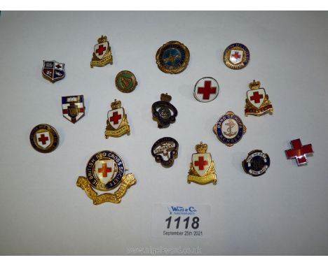 A quantity of enamel badges including British Legion and Red Cross.