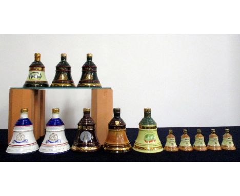 8 Assorted Bells Wade Decanters oc  incl:- 1 x 12 YO, 1 x Christmas 1990, 1 x 8YO Christmas 1998, 2 x  Christmas 1993, 1 x 18
