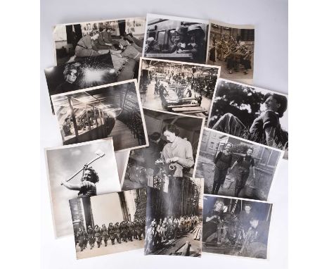 PRESS PHOTOGRAPHY, WOMEN AT WAR. An interesting selection of approximately sixty-three black and white photographs of women's