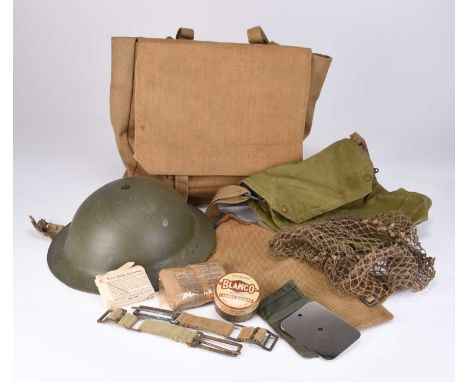 MkII British Army helmet with net and wound dressings, apparently in original finish, together with a group of webbing includ