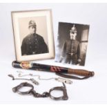 POLICE INTEREST - Met Police whistle, handcuffs, Victorian truncheon, two portrait photographs