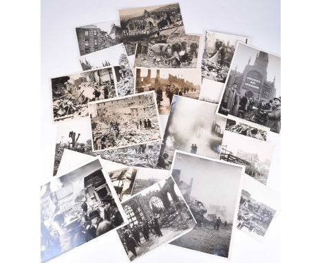 PRESS PHOTOGRAPHY, Second World War. Twenty-one black and white photographs relating to Air Raid / Blitz Damage, circa 1940-4