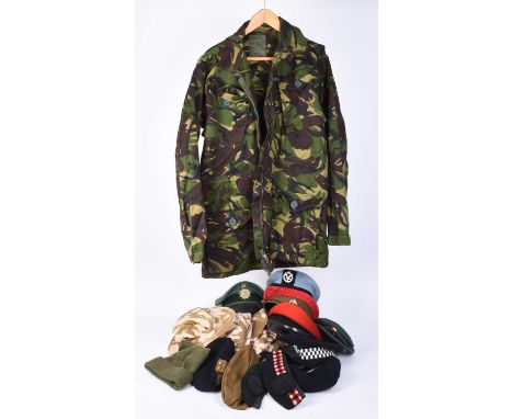 Assorted uniform comprising Royal Logistic Corps Officer's beret, Devon and Cornwall Constabulary peaked cap, Royal Military 