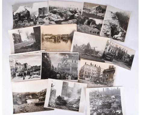 PRESS PHOTOGRAPHY. A mixed lot of approximately 104 Second World War black and white photographs by Air Ministry, Keystone an